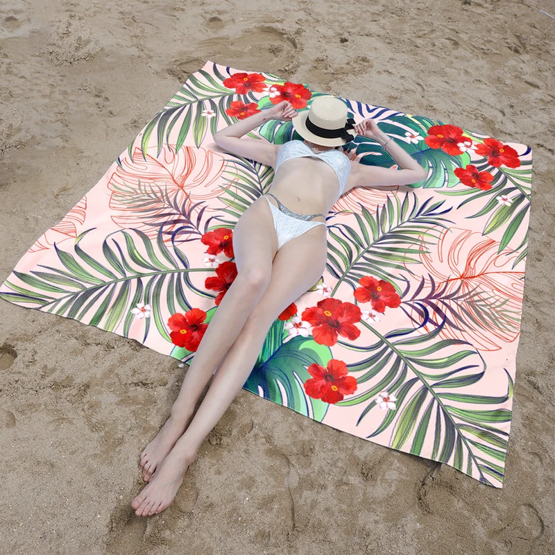 Stranddecke mit lebendigem Blumendesign und innovativer Struktur Skanto