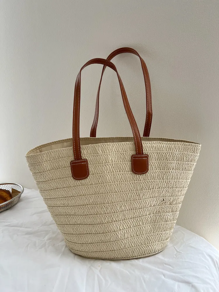 Handgefertigte Strohtasche mit eleganten Ledergriffen Skanto