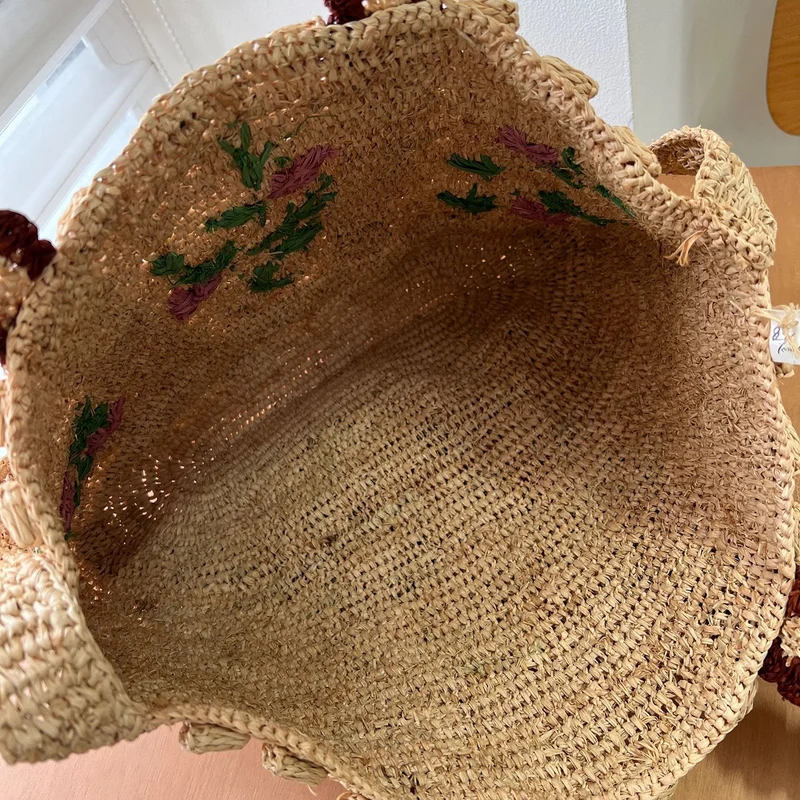 Geflochtene Umhängetasche mit Blumenmuster Skanto