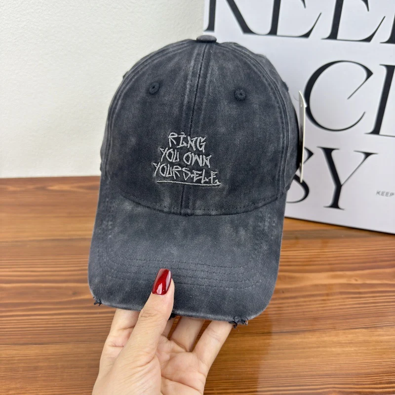 Damen Baseballkappe im Used-Look mit Motiv Skanto