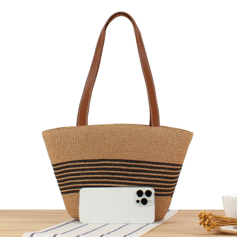Strandtasche mit geflochtenem Muster und eleganten Ledergriffen Skanto