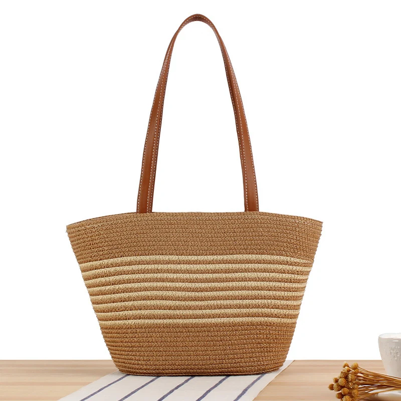 Strandtasche mit geflochtenem Muster und eleganten Ledergriffen Skanto