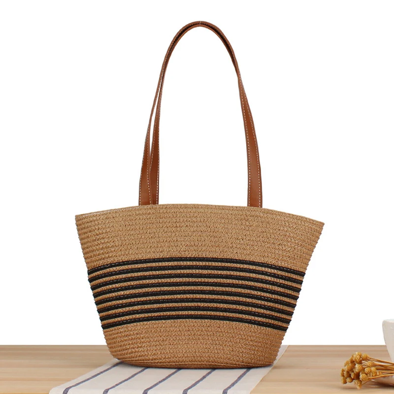 Strandtasche mit geflochtenem Muster und eleganten Ledergriffen Skanto