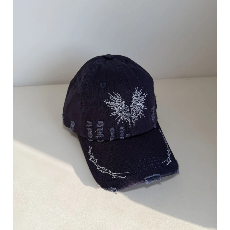 Damen Snapback Cap im Used-Look mit Grafik Skanto
