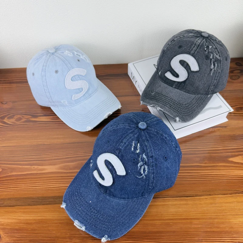 Damen Baseballkappe im Used-Look mit Grafik-Logo Skanto
