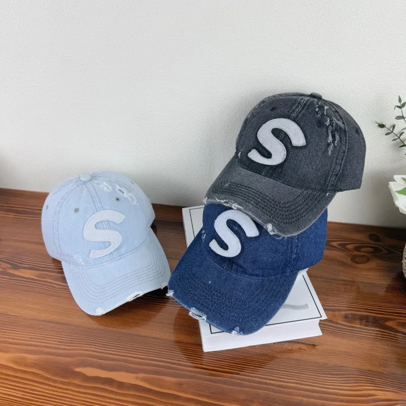 Damen Baseballkappe im Used-Look mit Grafik-Logo Skanto