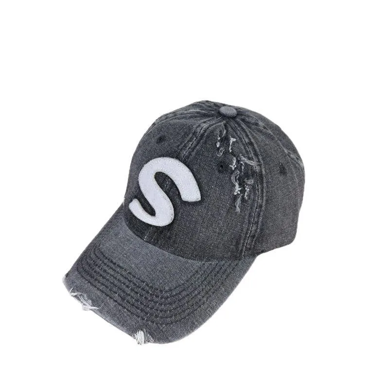 Damen Baseballkappe im Used-Look mit Grafik-Logo Skanto