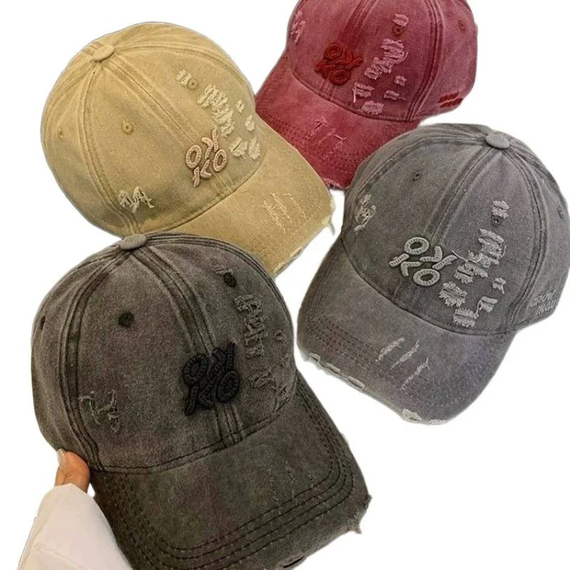 Damen Baseballkappe im Used-Look mit Grafikstickerei Skanto