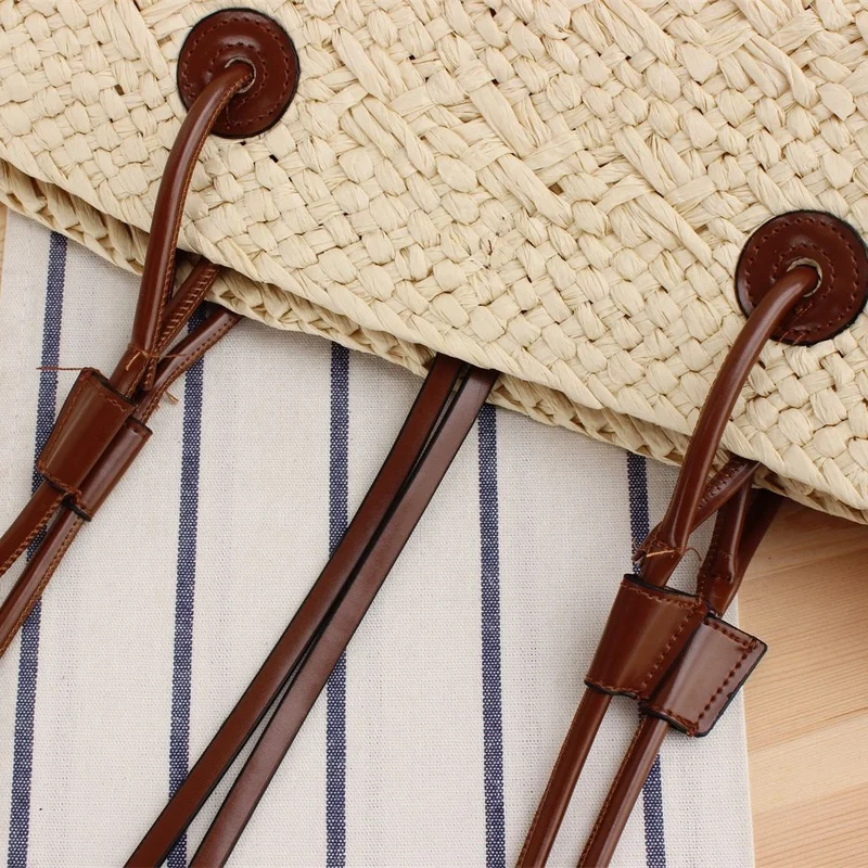 Strandtasche aus hochwertigem geflochtenem Bast mit stilvollen Ledergriffen Skanto