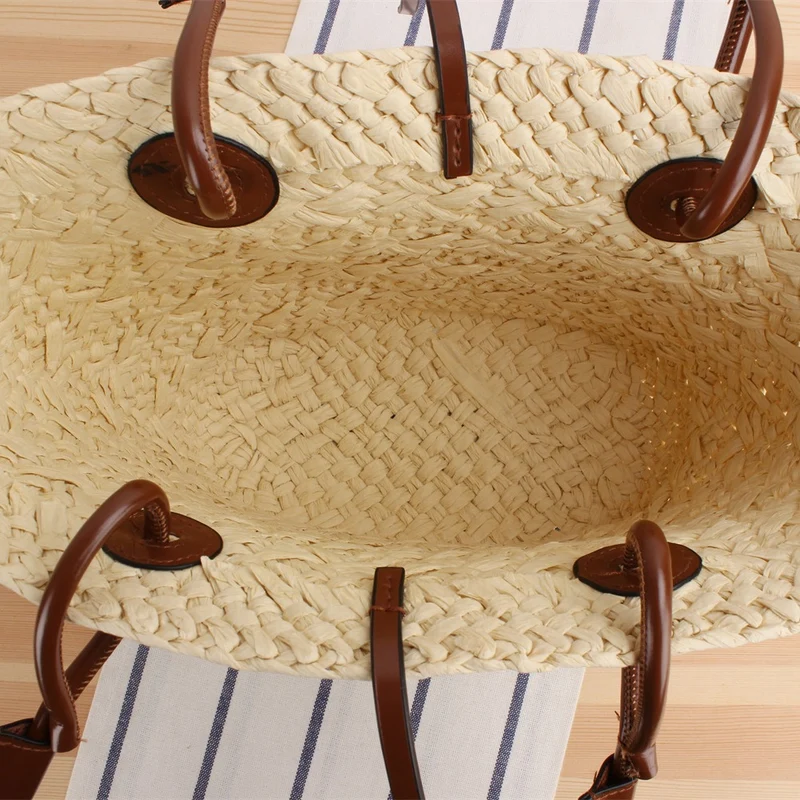 Strandtasche aus hochwertigem geflochtenem Bast mit stilvollen Ledergriffen Skanto