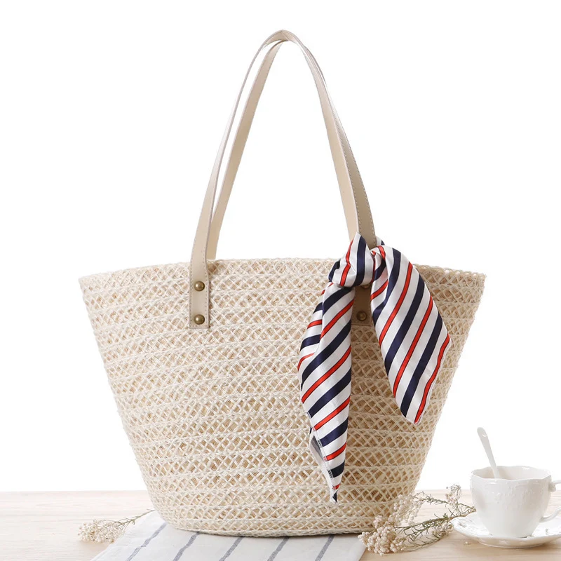 Strohtasche aus geflochtenem Material mit eleganter Schleifendekoration Skanto