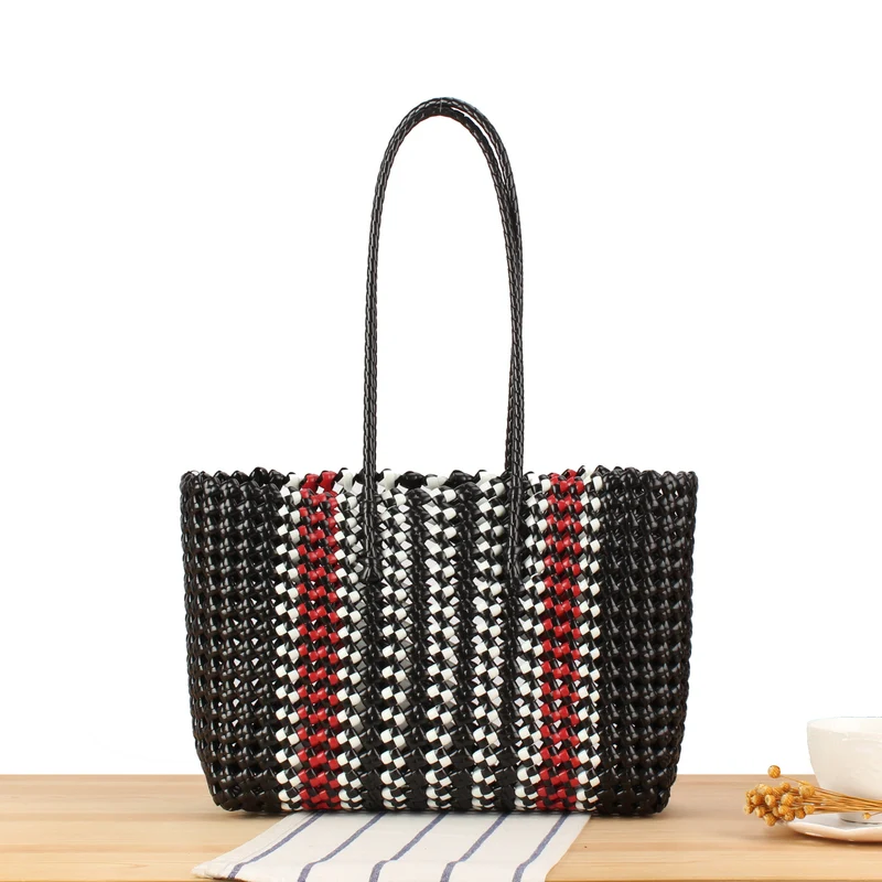 Stylische Handtasche aus gewebtem Material Skanto