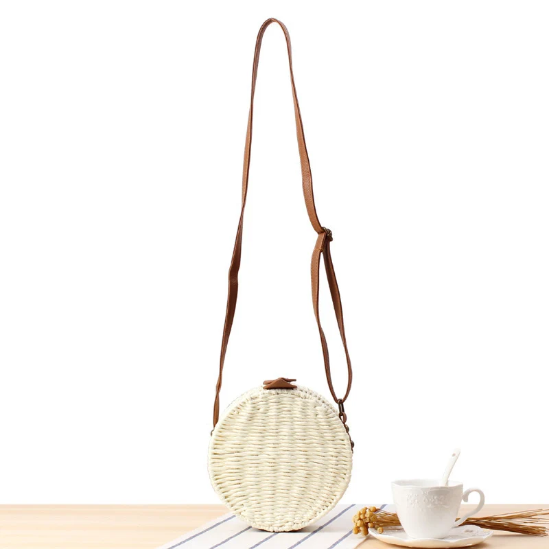 Runde gewebte Tasche mit Lederdetails Skanto