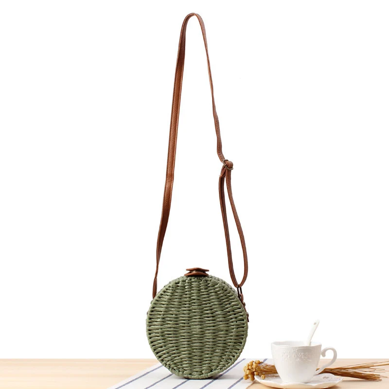 Runde gewebte Tasche mit Lederdetails Skanto