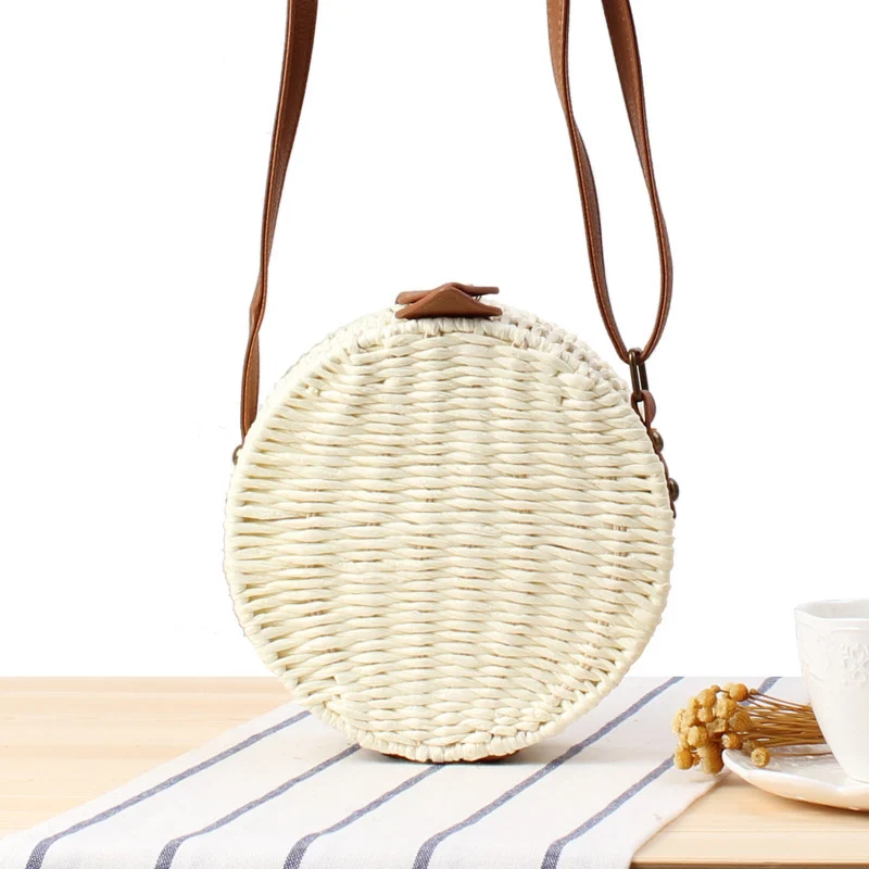 Runde gewebte Tasche mit Lederdetails Skanto