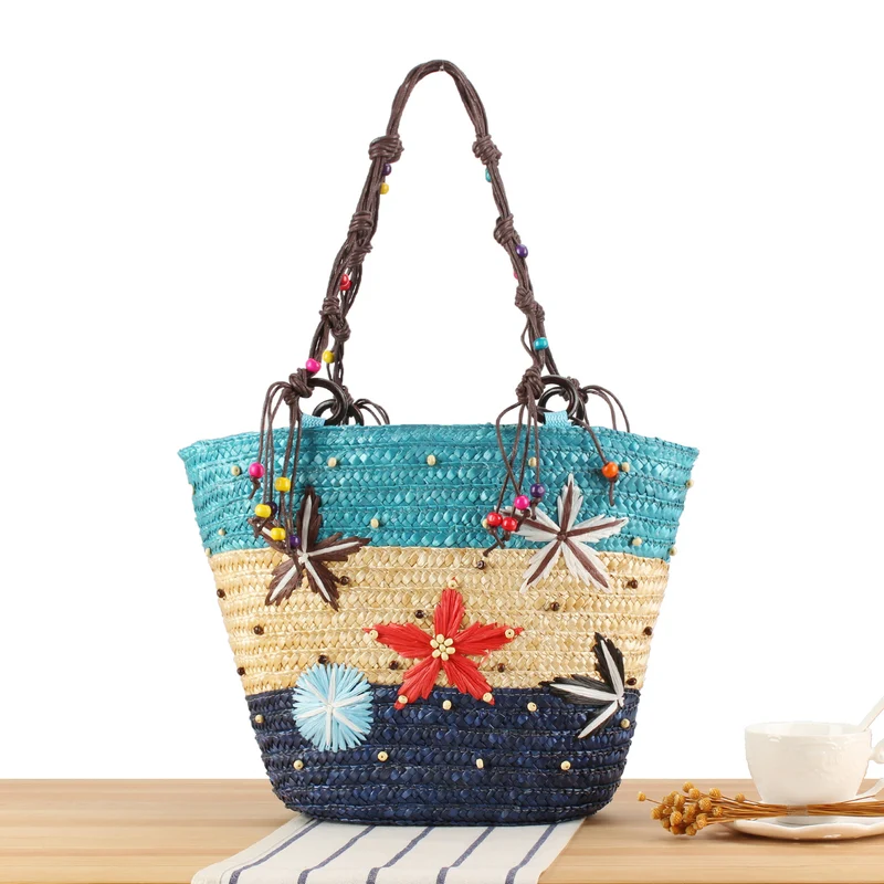 Handgefertigte Strandtasche mit fröhlichem Blumendesign Skanto