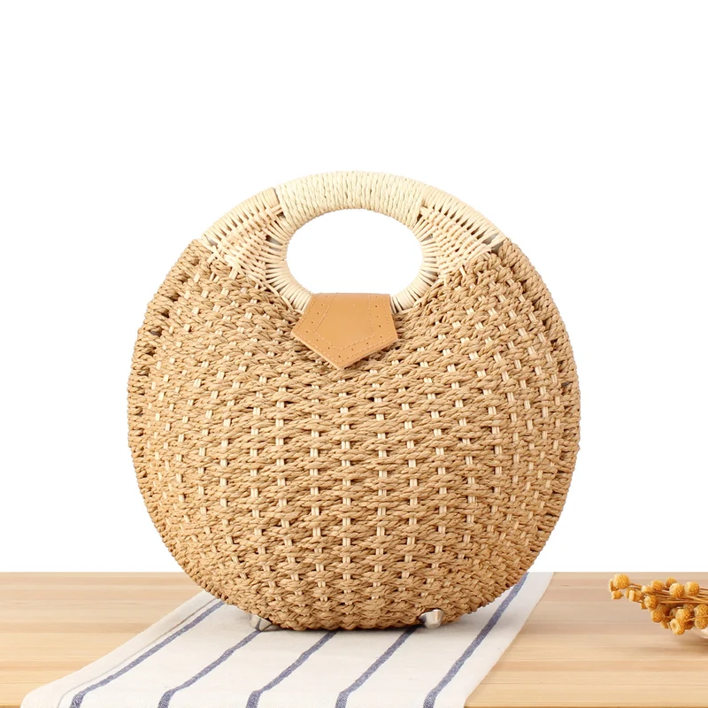Runde Strohtasche mit elegantem Ledergriff Skanto