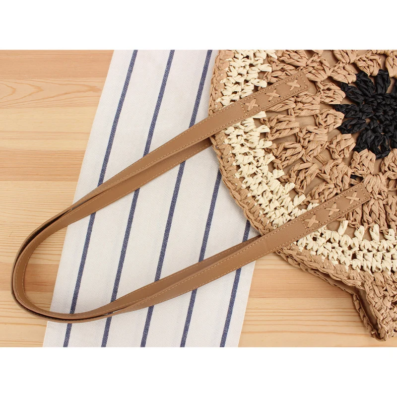 Runde Raffia-Korbtasche mit handgewebtem Design Skanto