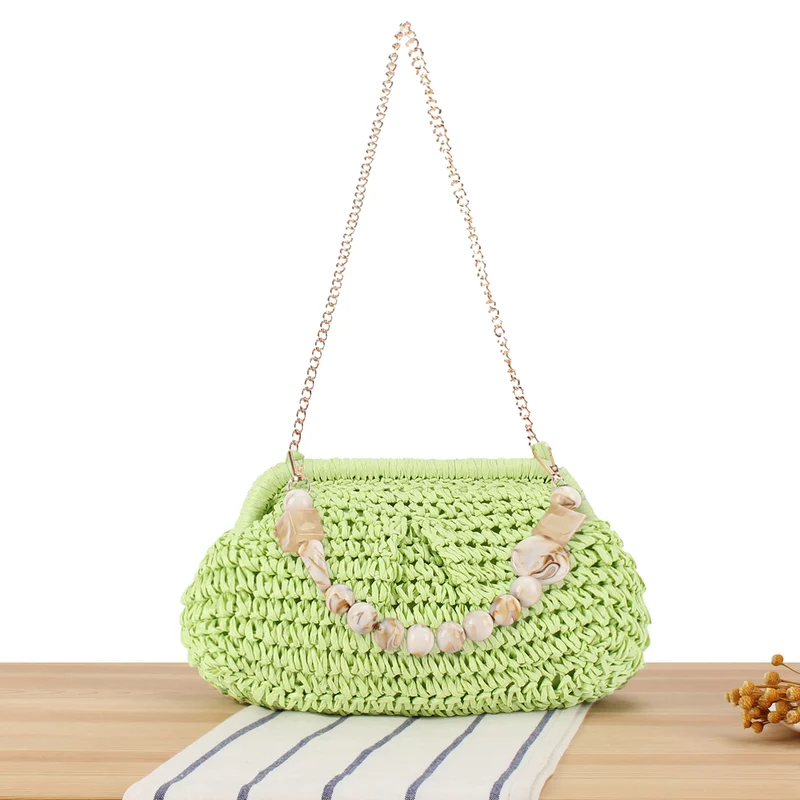 Geflochtene Clutch mit Perlenakzent Skanto