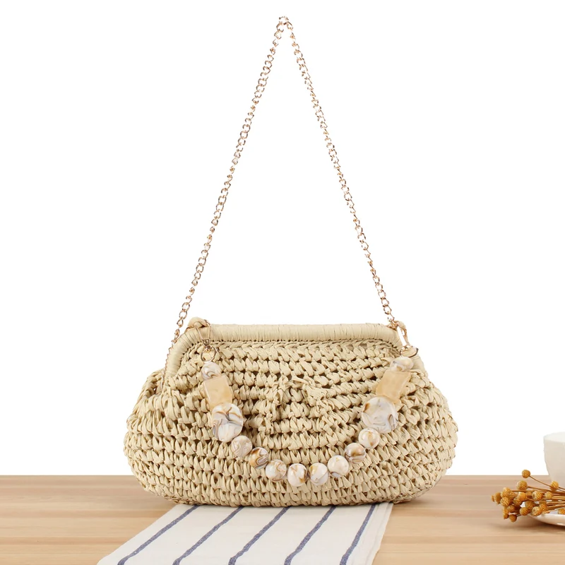 Geflochtene Clutch mit Perlenakzent Skanto