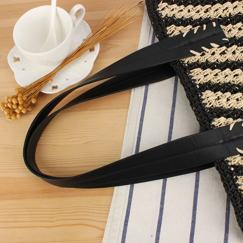 Handtasche mit elegantem Streifenmuster und robusten Ledergriffen Skanto