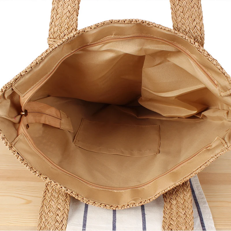 Umweltfreundliche Raffia-Einkaufstasche mit elegantem Quasten-Detail Skanto