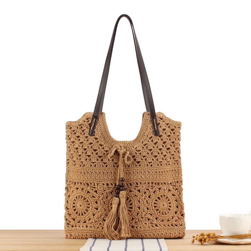 Kreative Makramee-Handtasche mit Fransen-Details Skanto