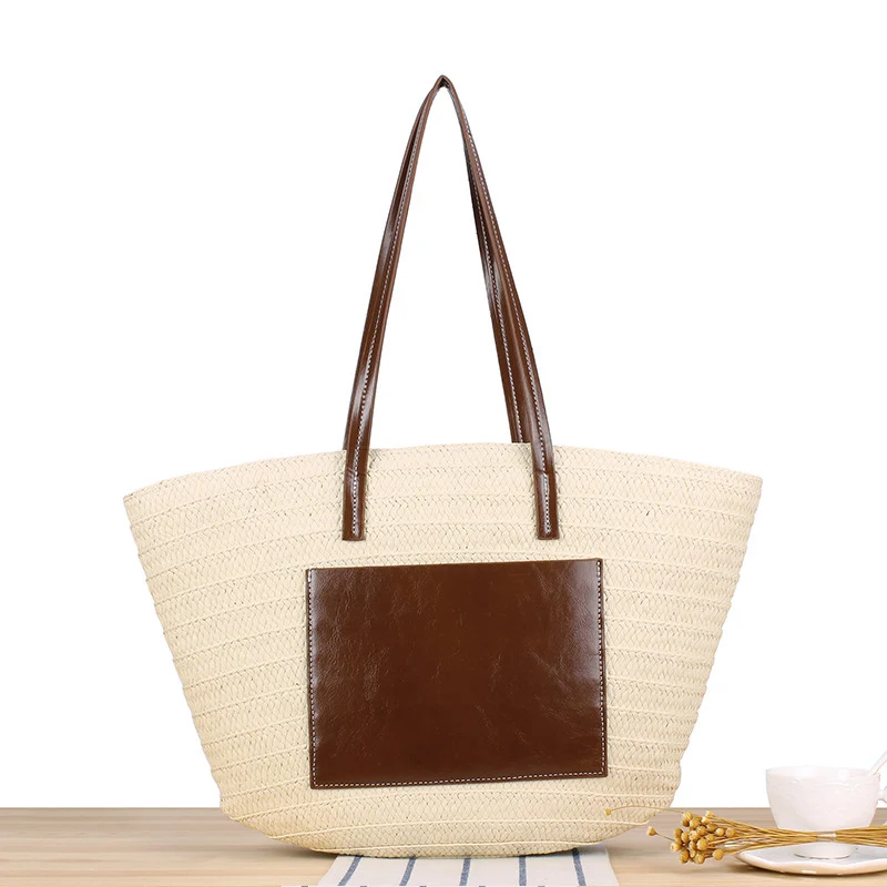 Trendige Stroh-Strandtasche mit Lederdetails Skanto