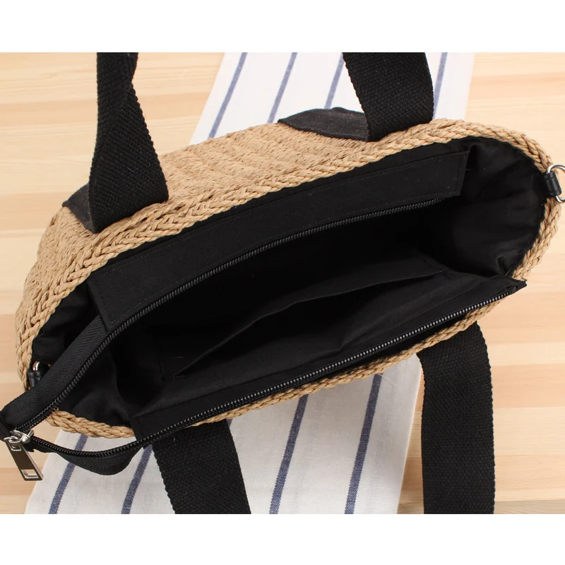 Elegante gewebte Handtasche mit kontrastierenden Riemen Skanto