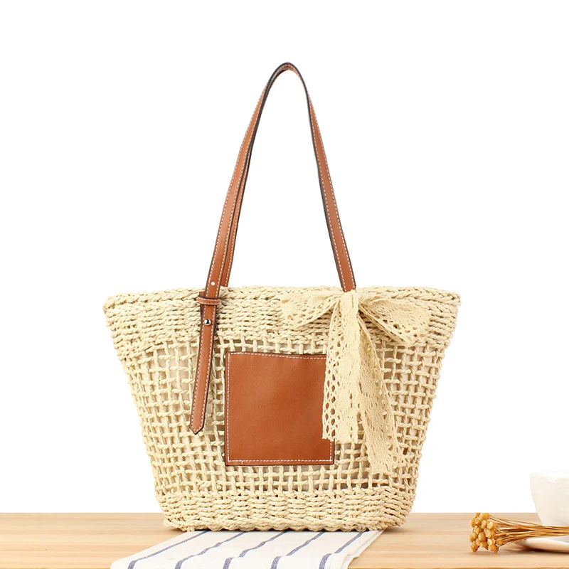 Eleganter gewebter Raffia-Korb mit Canvas-Akzent Skanto