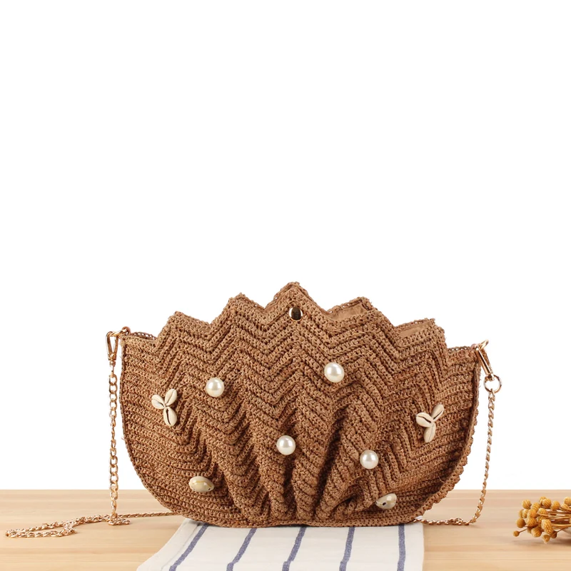 Elegante Clutch aus handgewebtem Material mit einzigartigem Wellenmuster Skanto
