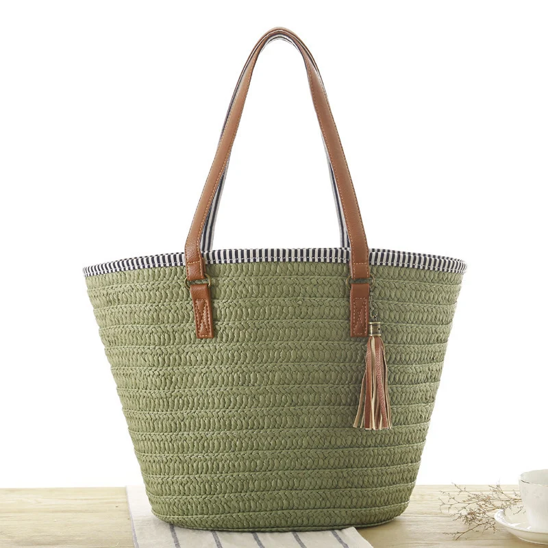 Geflochtene Strandtasche mit eleganten Ledergriffen Skanto