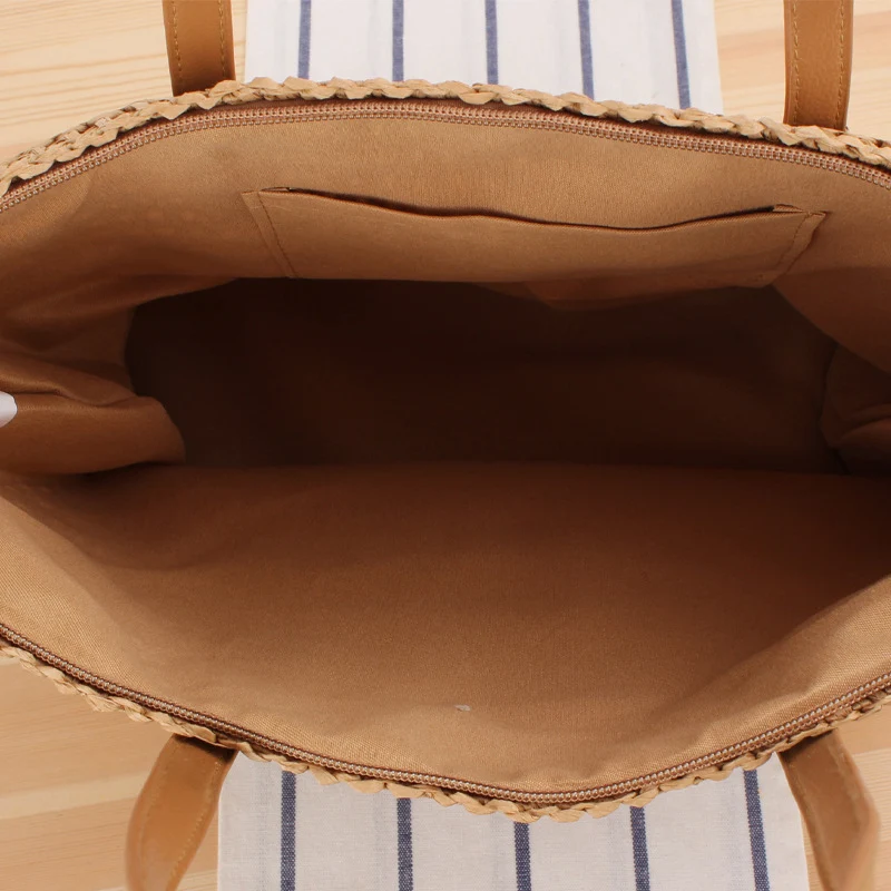 Elegante Stroh-Handtasche mit robusten Ledergriffen Skanto