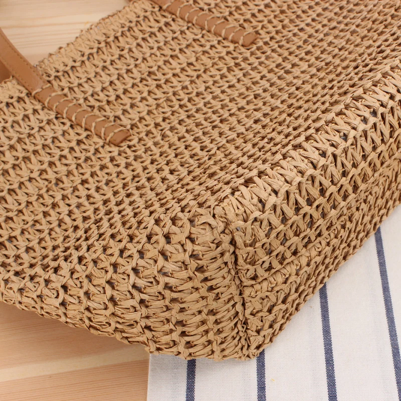 Elegante Stroh-Handtasche mit robusten Ledergriffen Skanto