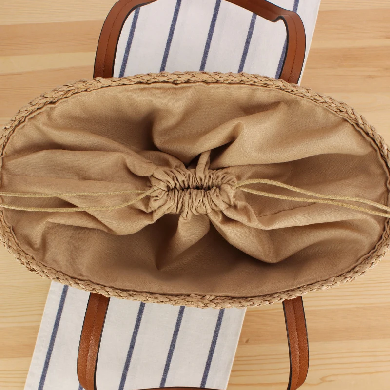 Robuste Raffia-Tragetasche mit stabilen Ledergriffen Skanto