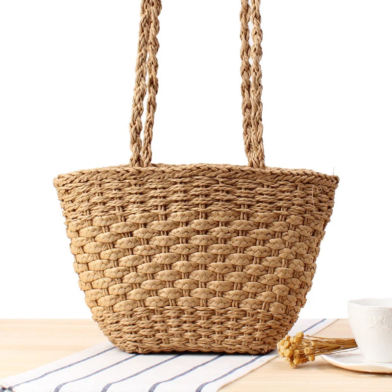 Geflochtene Tragetasche aus Natur-Raffia mit robusten Trageriemen Skanto