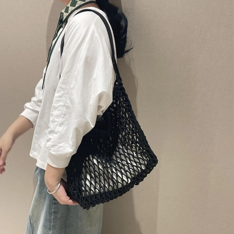Elegante Netztasche mit Ledergriff Skanto