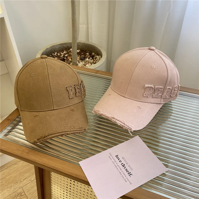 Damen Baseball Cap mit Peace-Grafik im Used-Look Skanto