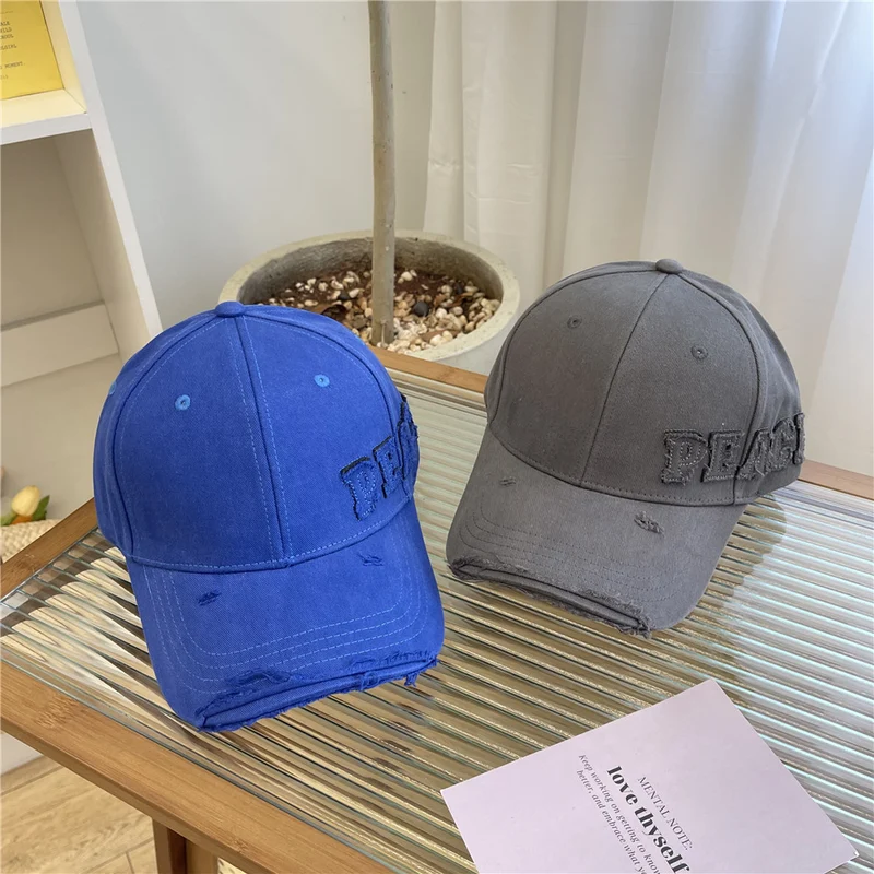 Damen Baseball Cap mit Peace-Grafik im Used-Look Skanto