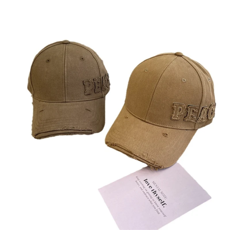 Damen Baseball Cap mit Peace-Grafik im Used-Look Skanto