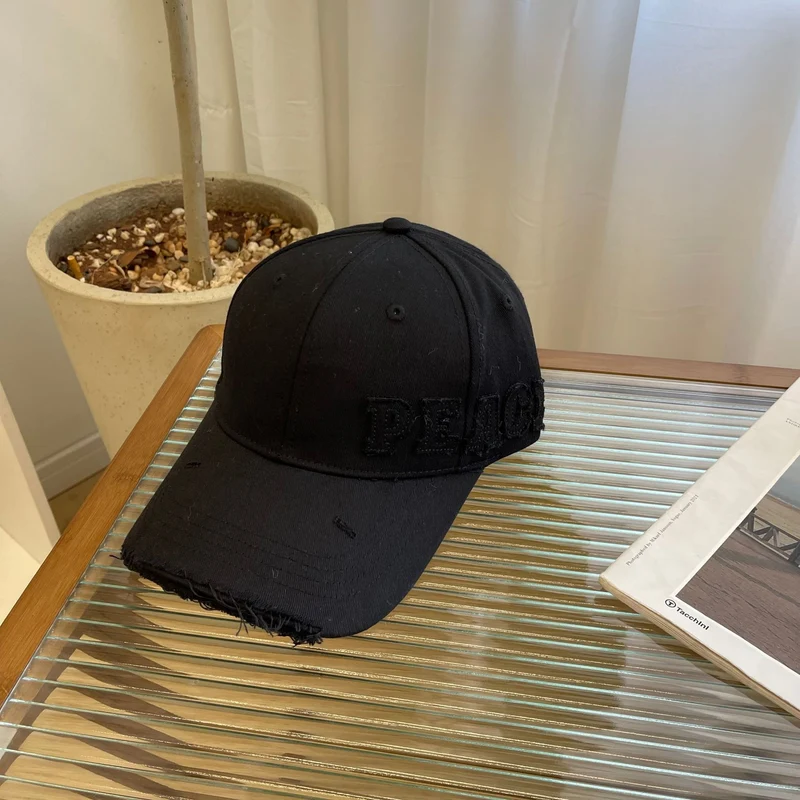 Damen Baseball Cap mit Peace-Grafik im Used-Look Skanto