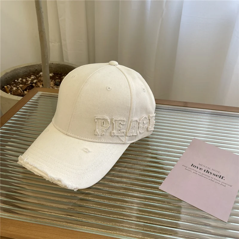 Damen Baseball Cap mit Peace-Grafik im Used-Look Skanto