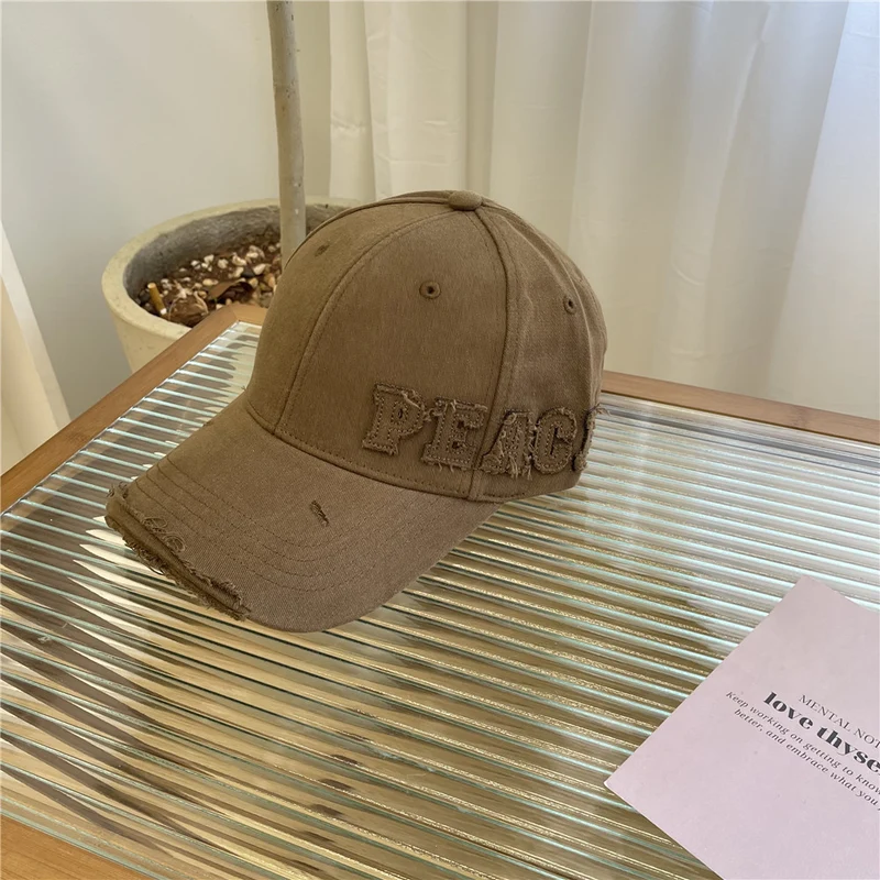 Damen Baseball Cap mit Peace-Grafik im Used-Look Skanto