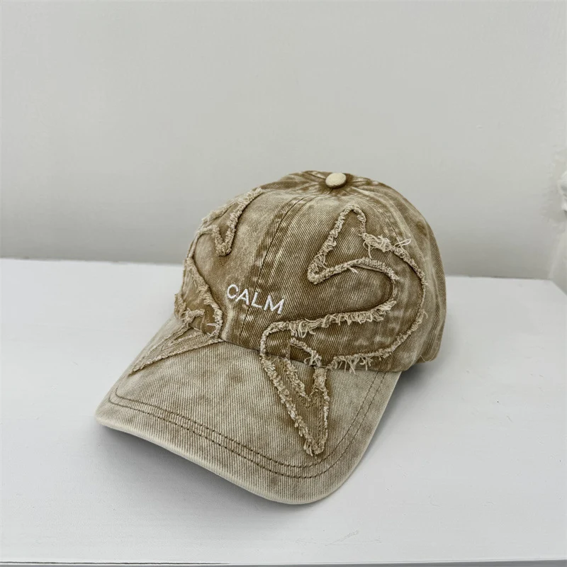 Damen Baseball Cap mit Grafik im Used-Look Skanto