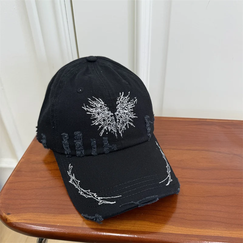 Damen Baseball Cap mit Grafik im Used-Look Skanto