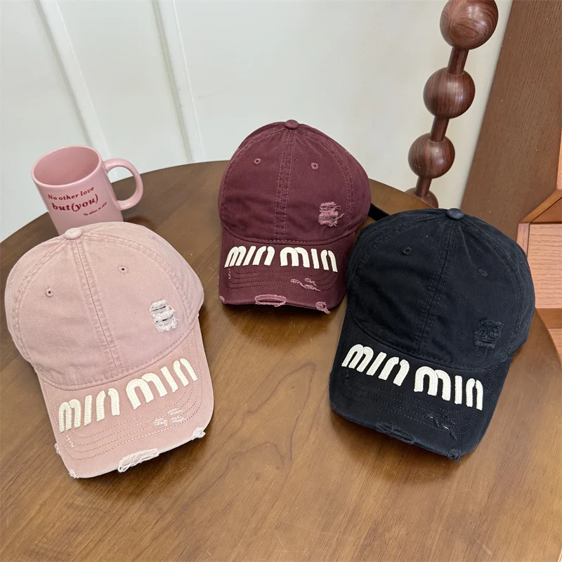 Damen Baseball Cap mit Grafik im Used-Look Skanto