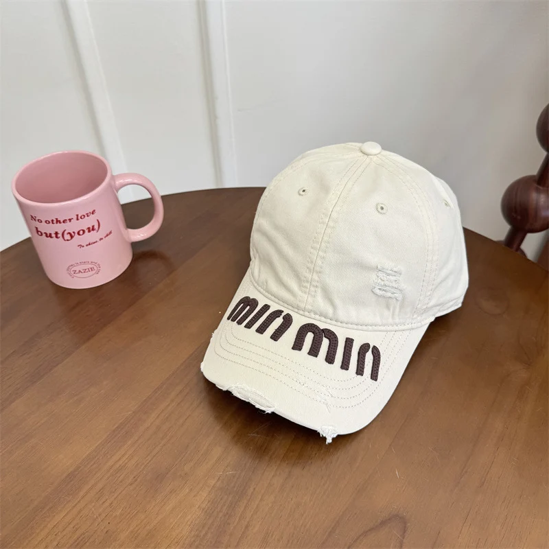 Damen Baseball Cap mit Grafik im Used-Look Skanto
