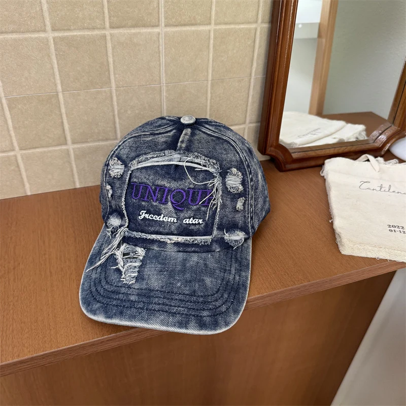 Herren Baseballkappe aus Used-Denim mit Grafik Skanto