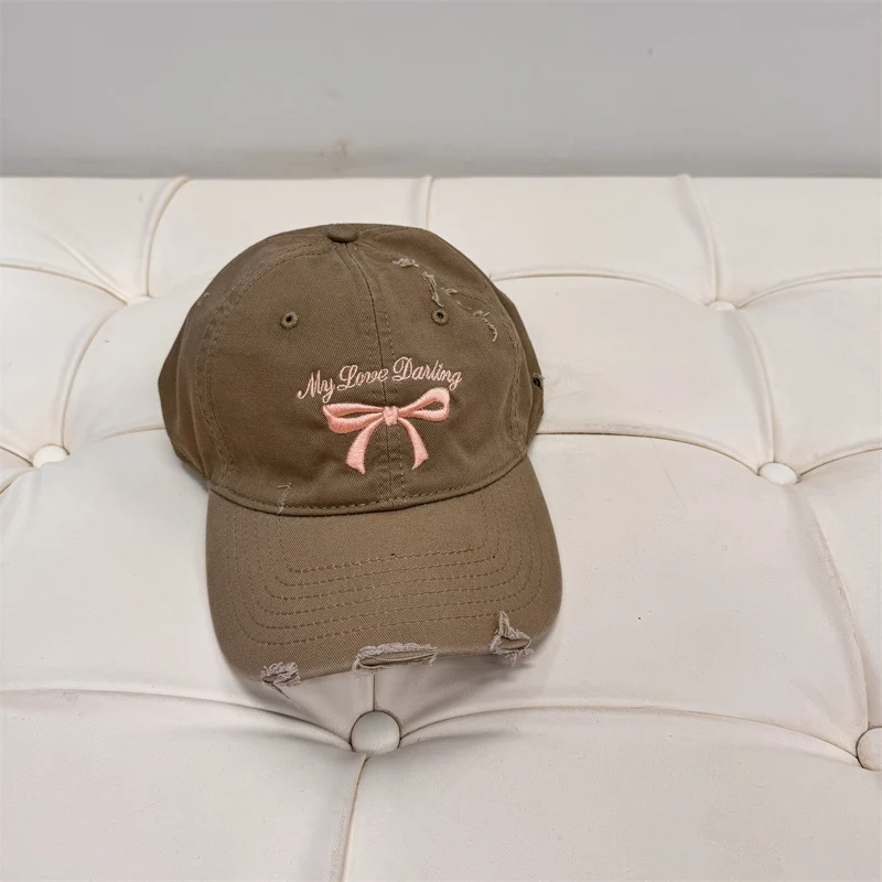 Damen Baseball Cap aus gewaschener Baumwolle mit Schleifenstickerei Skanto