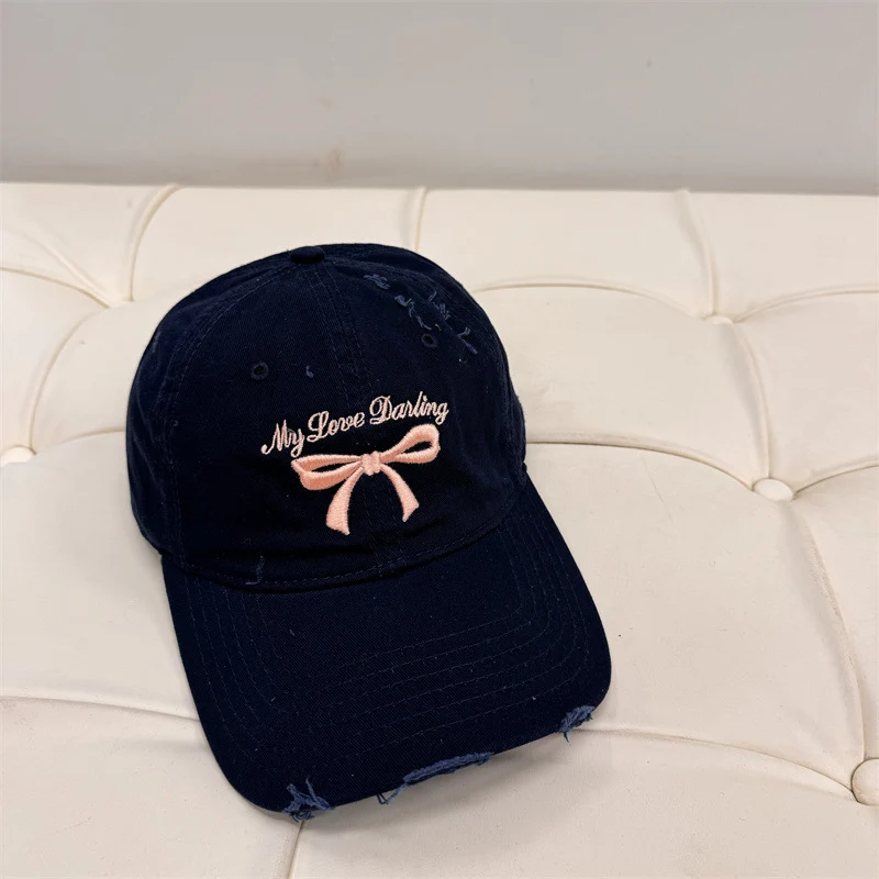 Damen Baseball Cap aus gewaschener Baumwolle mit Schleifenstickerei Skanto
